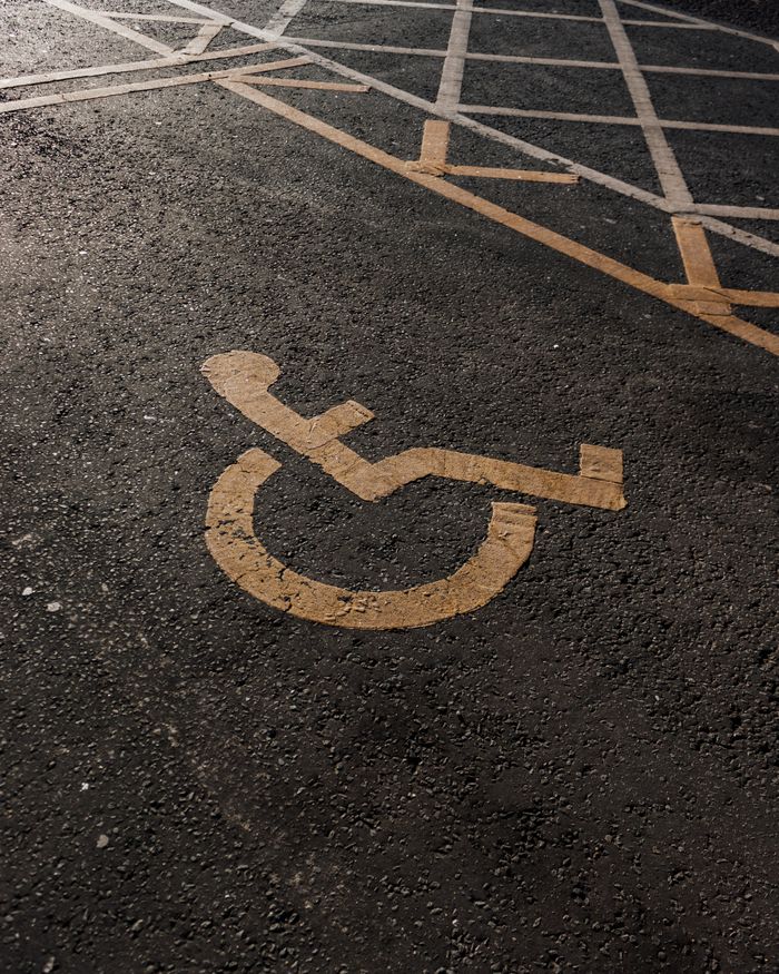 Parking space with the international access symbol for wheelchair accessibility